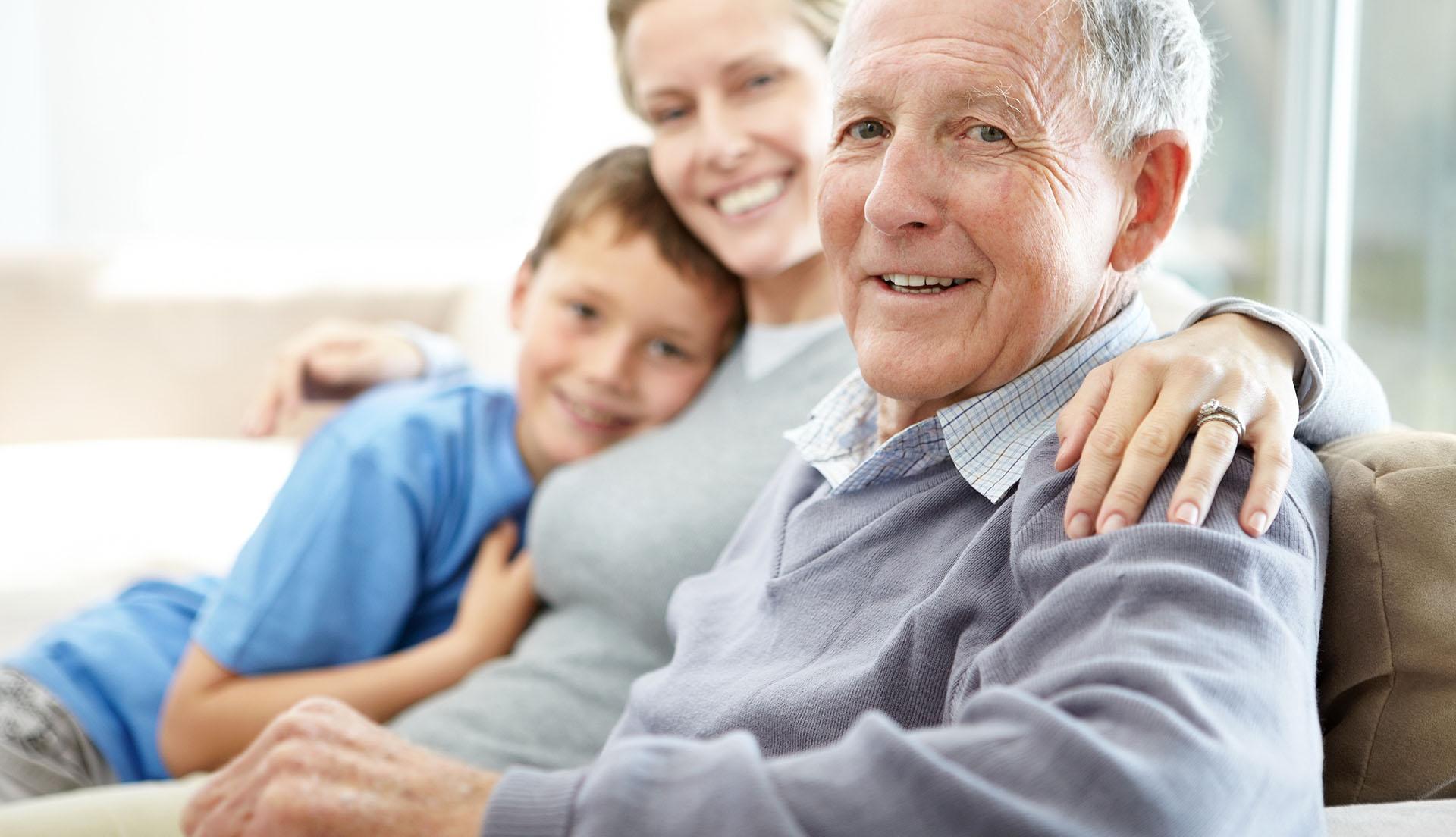 An older man with his family